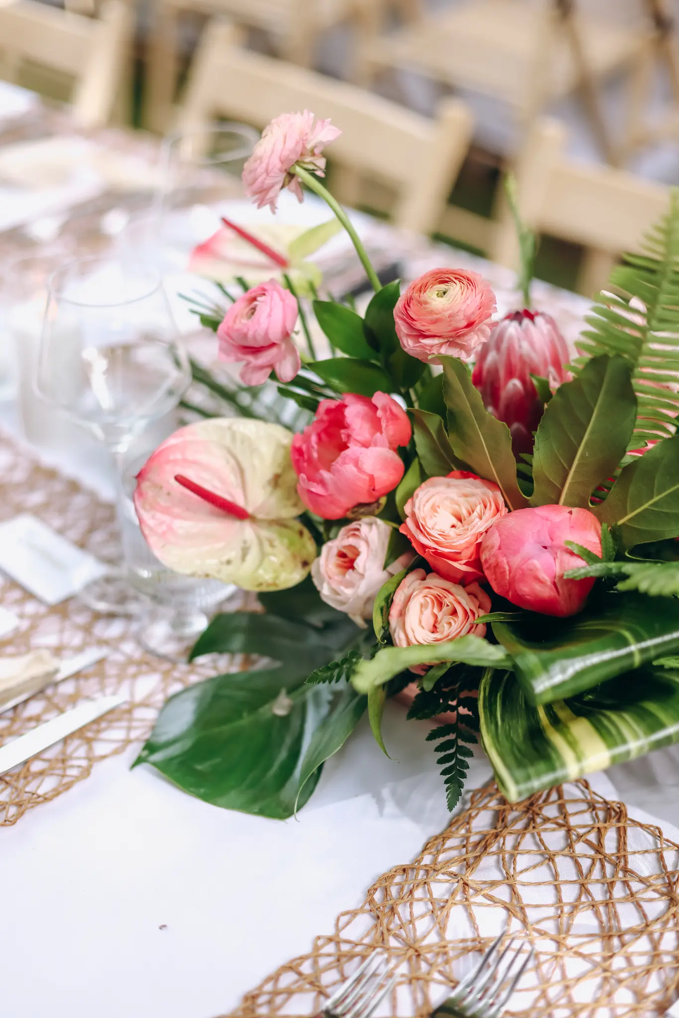 Colorful floral centerpiece arranged on a wedding reception table