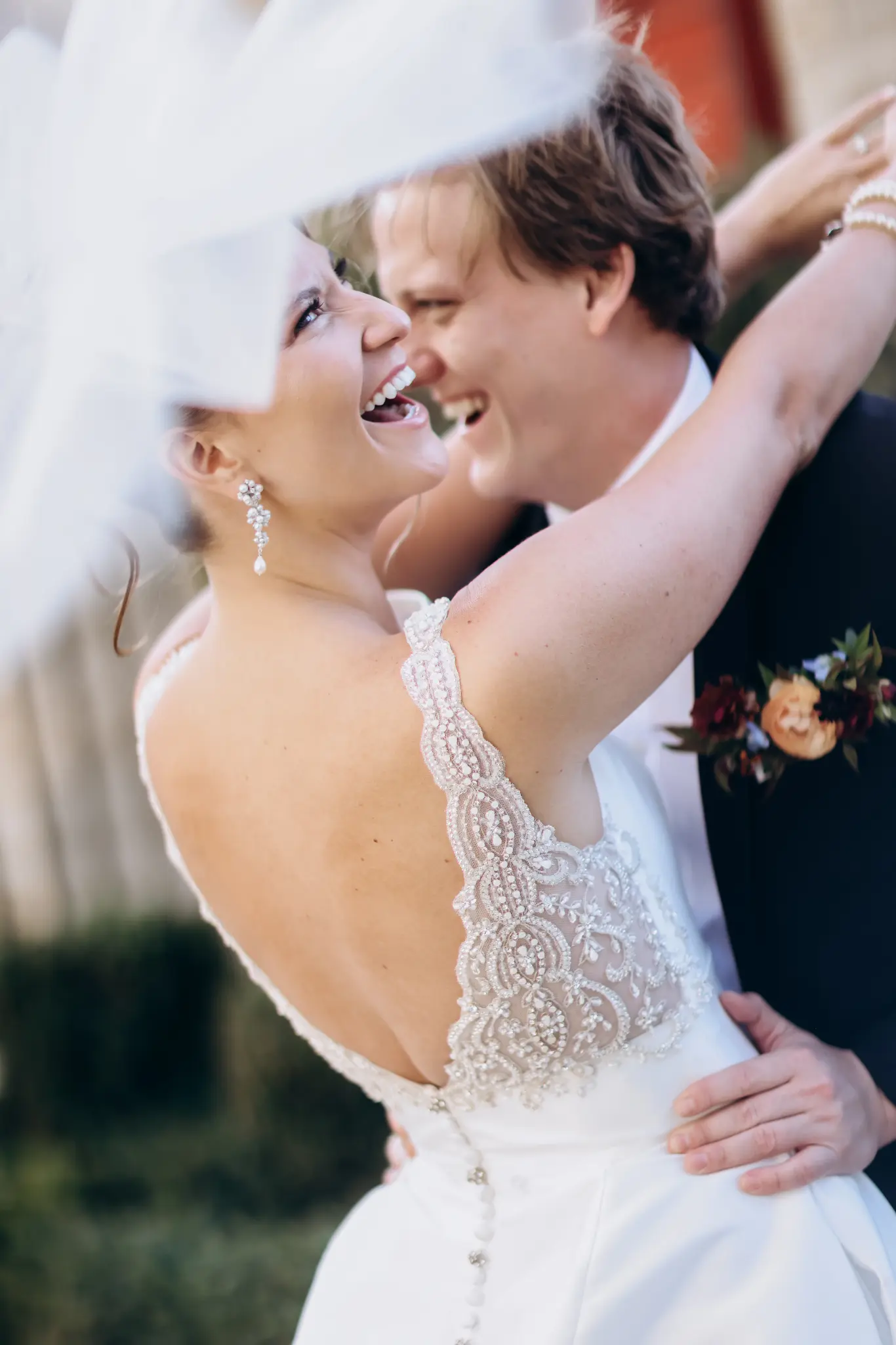 Bride and groom embracing during their wedding celebration